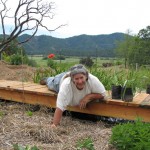 Karyn planting in the bog.